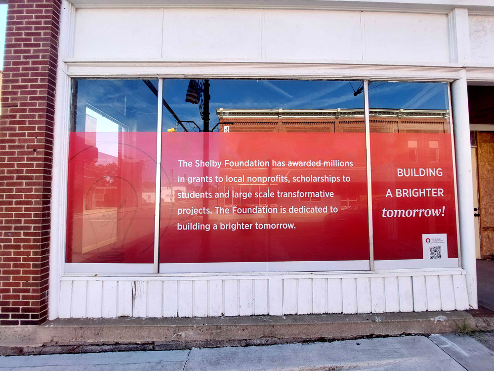 Dedication statement of The Shelby Foundation on window decals