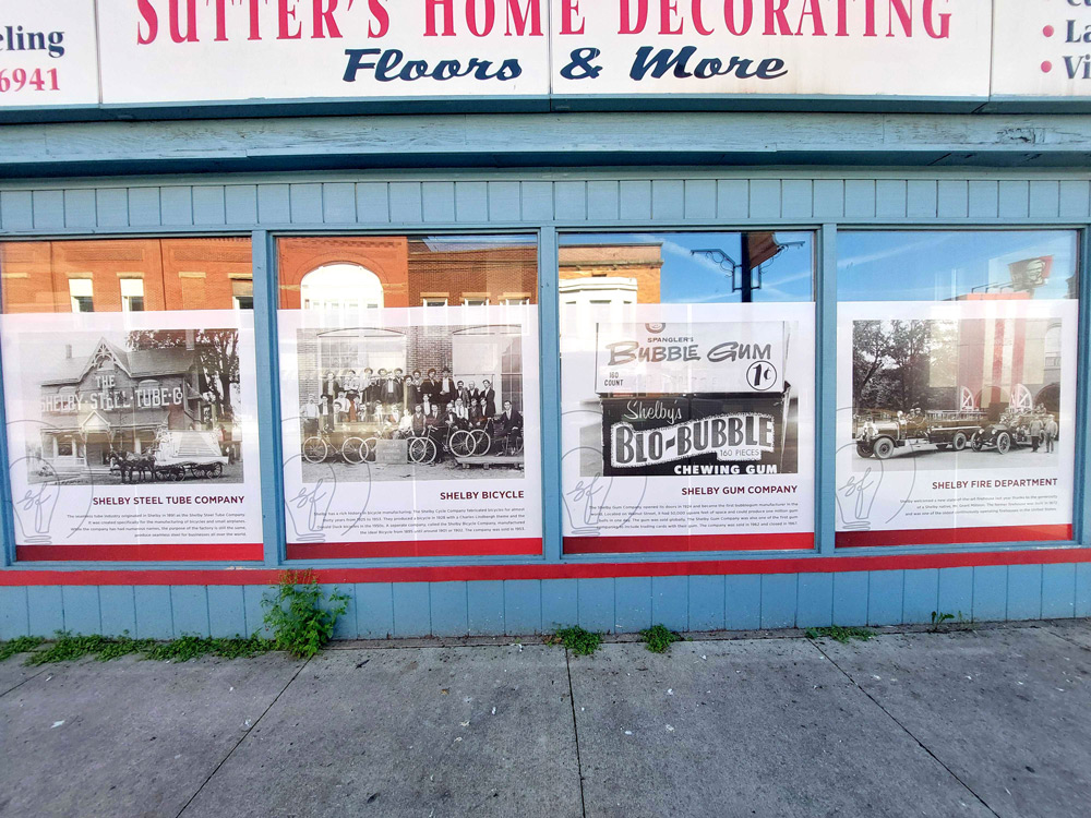 Series of historic decals on Sutter Building windows